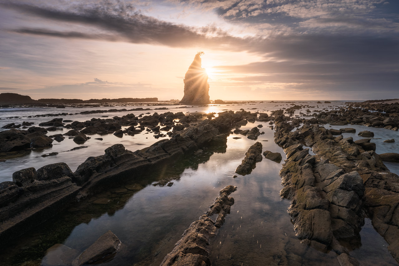 Rocks and reflections at Tanjung Layer in Sawarna