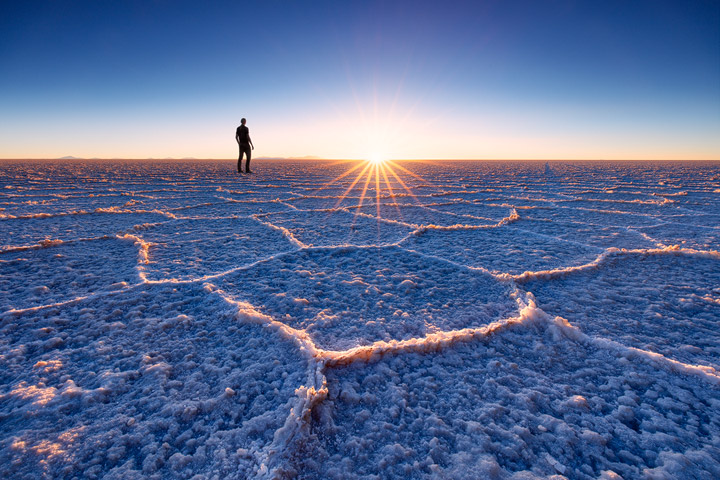 Intricate salt structures glow during sunset in Salar de Uyuni