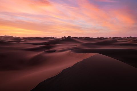 Desert Burn Burning skies above the dunes of the Moroccan Desert.