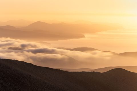 Zara Haze View of Costa de Calma and its surrounding coastline and hills from Pico de la Zara during sunrise.