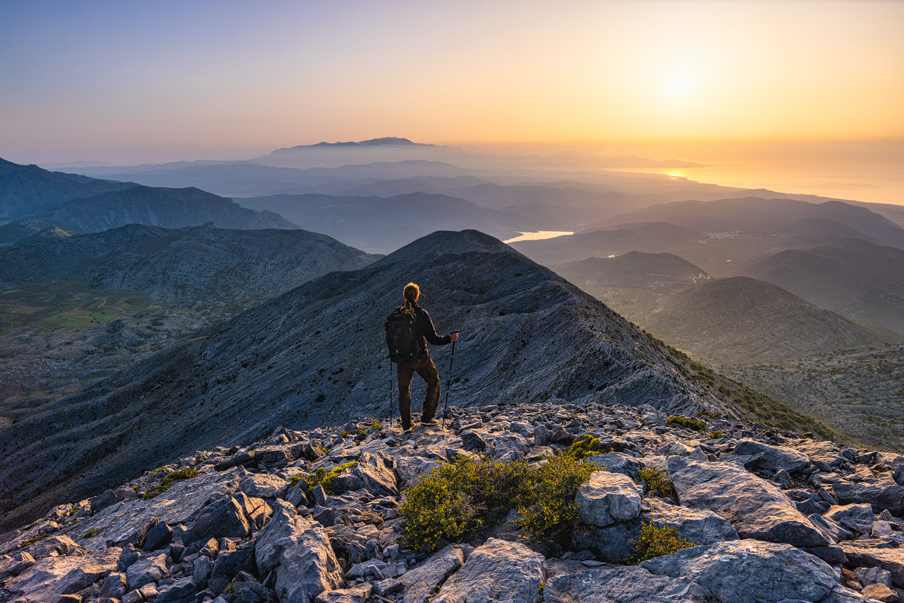A hiker on top of the Selena Mountain on Crete