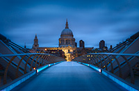 The view of St. Paul's Cathedral from Millennium Bridge during blue hour